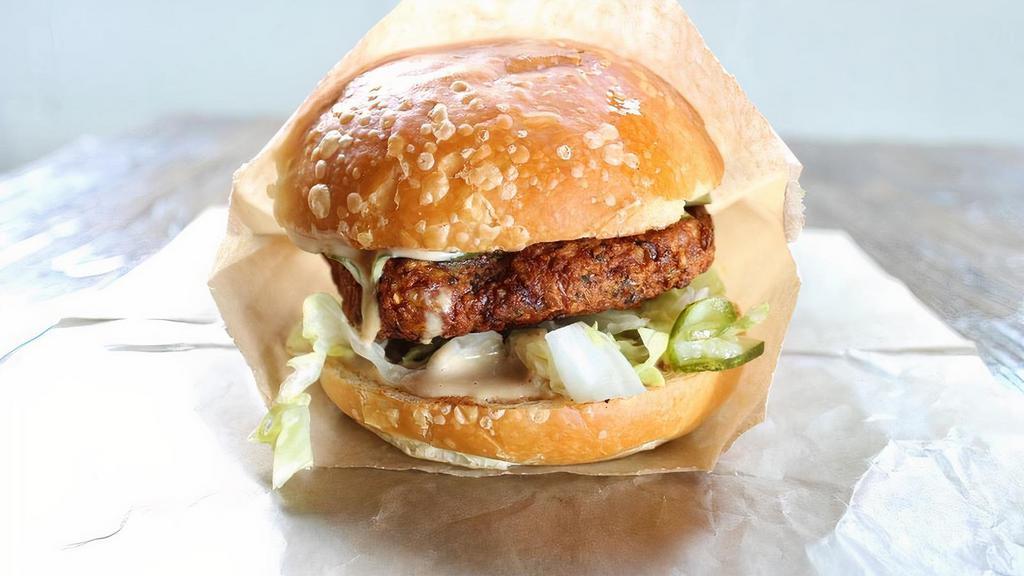 Falafel Burger · Chickpea, onion, parsley, cilantro, cumin, tahini sauce, red onion, lettuce, pickle (Vegan, Gluten-Free Possible)