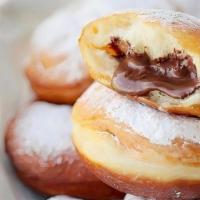 Nutella Donut · This Nutella filled donut makes the softest, puffiest donuts ever. Filled with warm Nutella!