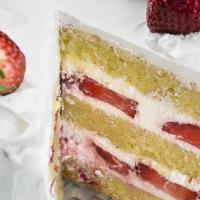 Strawberry Shortcake · A tender vanilla cake filled with layers of whipped cream frosting and juicy strawberries. T...