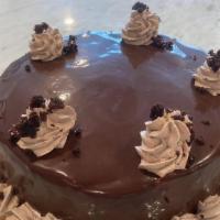 Chocolate Mousse Cake · A simple, moist, layered chocolate cake, filled with dark chocolate mousse, and then a warm ...