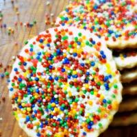 Large Sprinkle Shortbread · These rainbow sprinkle shortbread cookies are colorful slice and bake cookies that are butte...