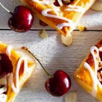 Cherry Turnover · This easy Cherry Turnover is made from puff pastry dough filled with a sweetened cream chees...