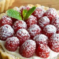 Mixed Berry Tart · Use your favorite combination of berries to top vanilla bean-flecked pastry cream in a graha...