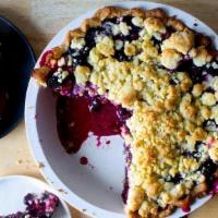 Blueberry Crumb Pie · This blueberry crumble pie is filled with tons of blueberries, topped with a crunchy cinnamo...
