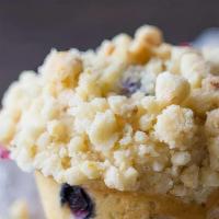 Blueberry Crumb Muffin · Homemade blueberry muffins stuffed full of fresh blueberries and topped with a buttery cinna...