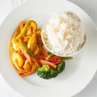 Curried Coconut Shrimp · Sauteed shrimp in curry coconut sauce. served with steamed vegetables and a side.