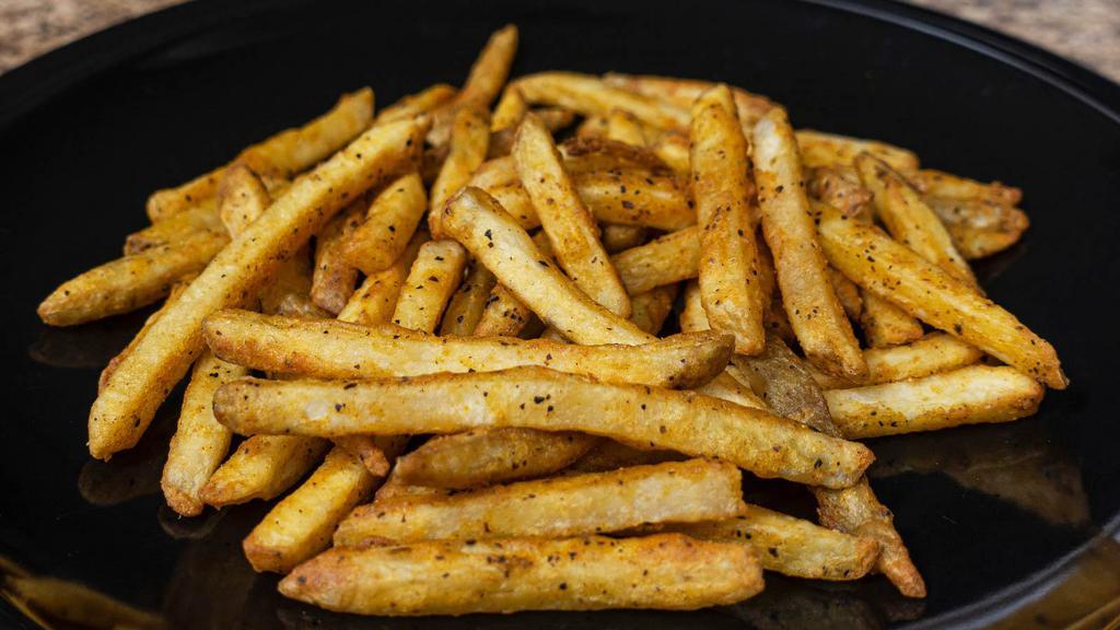 Seasoned Fries · Hand-cut deep fried crispy fries with house seasoning.