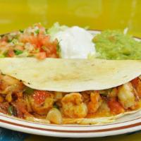 Shrimp Quesadilla · Sautéed shrimp, onions and bell pepper topped with our house salsa and guac and a dollop sou...