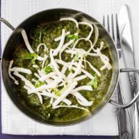 Palak Paneer · Homemade Cottage cheese cooked with fresh spinach, spices, and tomatoes.