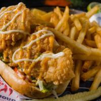 Fried Flounder Po'Boy · Louisiana style sandwiches served with toasted hero bread, lettuce, tomatoes, garlic spread,...