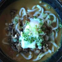 Curry Udon W. Beef · Beef, udon noodle, scallion, soft boiled egg in Japanese curry.