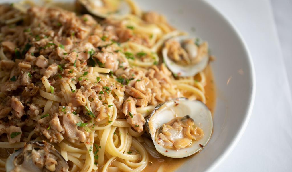 Linguini Clam Sauce · Whole little neck clams, chopped clams, peperoncino, garlic broth.