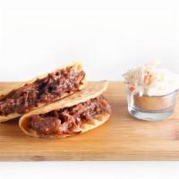 Pulled Beef Tacos (2) · Topped With Creamy Cole Slaw
