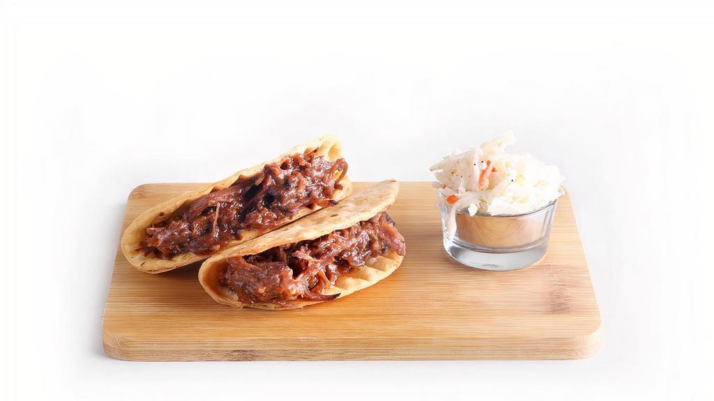 Pulled Beef Tacos (2) · Topped With Creamy Cole Slaw
