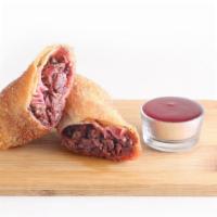 Brisket Egg Roll · Hickory Smoked Brisket with pickled onion, wrapped in a Egg Roll skin  With Sweet n  Sour Sa...