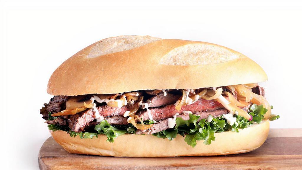 I.P. Steak Sandwich · Tender Steak Slices in Teriyaki or Bourbon BBQ Sauce, Lettuce, Sauteed Onions, Mushrooms & Garlic Mayo