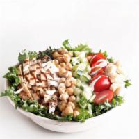 Icon Salad · Your Choice of Crispy Shnitzel Or Grilled Chicken. Romaine Lettuce With Cherry Tomato's, Chi...