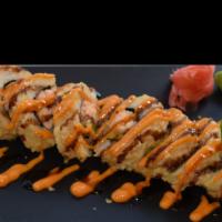 Tiger Roll · Salmon & Avocado Tempura, drizzled with Spicy Mayo & Sweet Sauce.