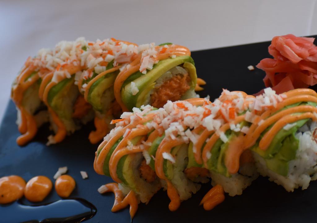 Dancing Dragon Roll · Spicy Tuna & Crunch, topped with Spicy Kani and Avocado.
