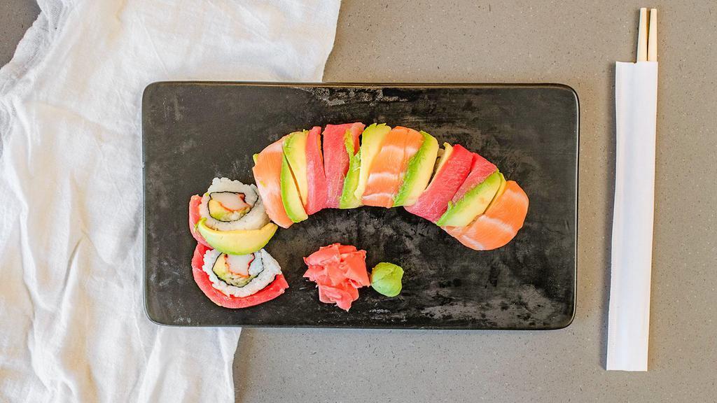 Rainbow Roll · Mock Crab, Avocado, & Cucumber, topped with Tuna, Salmon, Yellowtail, & Avocado.