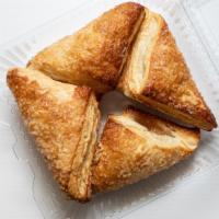 Apple Turnover · 4 Pack. Puff Pastry Filled with Apple Filling and Topped With Sugar.