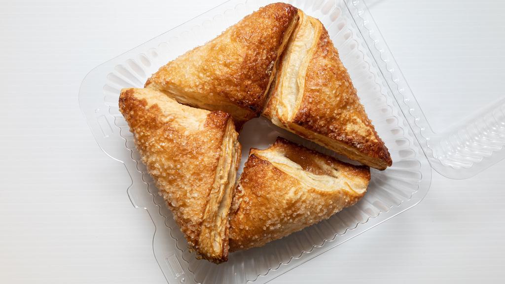 Apple Turnover · 4 Pack. Puff Pastry Filled with Apple Filling and Topped With Sugar.