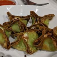 Crab Rangoon (4) · Vegetable wonton stuffed with cream cheese, celery, carrot and crab.