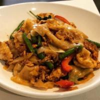 Pad Kee Mao (Drunken Noodle) · Stir fry flat noodle, garlic, fresh chili, egg, onion, bell pepper, string bean, and basil. ...