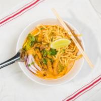 Khao Soi Noodle · Chicken or tofu in curry broth with egg noodle with scallion, cilantro, red onion, and pickl...