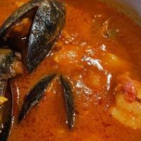 Mariscada · Spanish shellfish stew with Shrimp, Clams, Mussels and Scallops in a zesty sofrito broth acc...