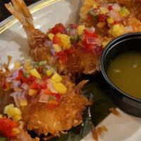 Coconut Shrimp · Crispy shrimp rolled in a coconut batter topped with mango salsa, red onions & diced Jalapeñ...