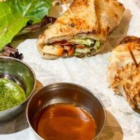 Chicken Tikka · Spice marinated chicken morsels wrapped with fresh salad and paratha.
