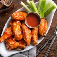 Buffalo Wings (5 Pcs) · Deep-fried chicken wings tossed in our Buffalo sauce and served with fries.