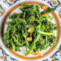 Broccoli Di Rabe Con Aglio & Olio · Italian broccoli sautéed with garlic and oil.