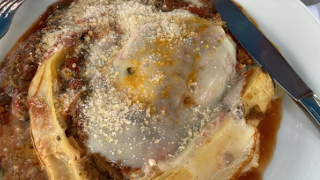 Lasagna Al Forno · Baked lasagna, meat sauce, ricotta, and Mozzarella.