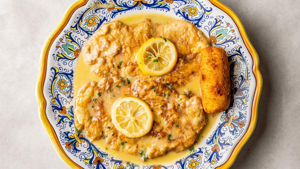 Salmone Livornese · Salmon with onions, capers, and green olives in marsala wine sauce.