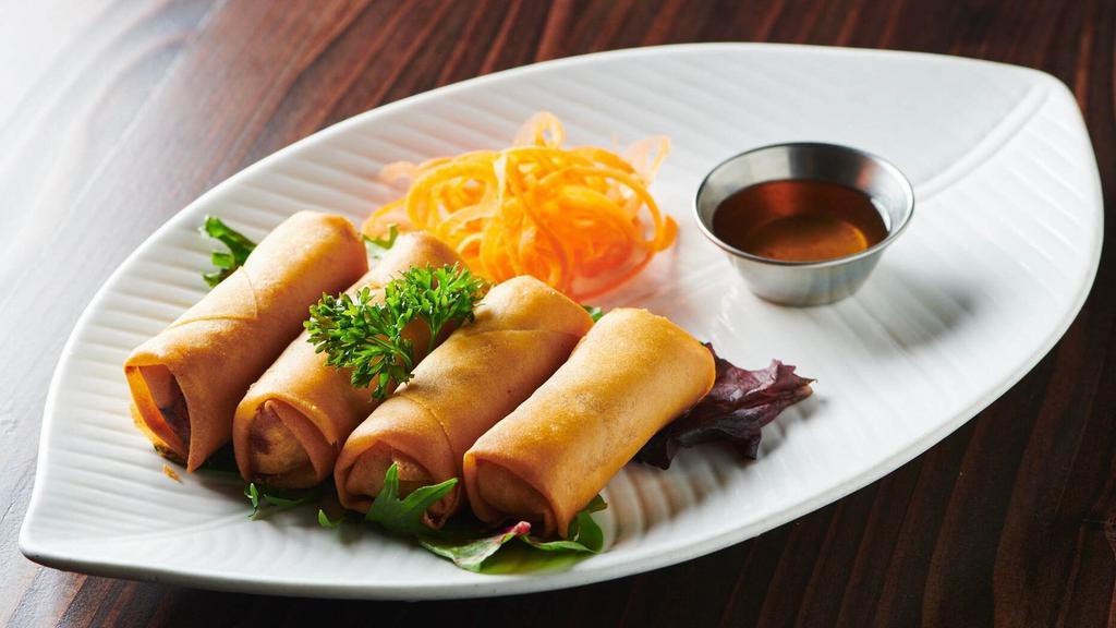 Vegetable Spring Rolls · Crispy Spring roll stuffed with cabbage, carrot and vermicelli noodle. Served with plum sauce.
