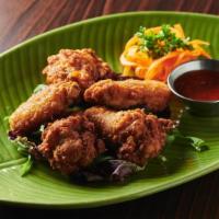 Bangkok Wings · Crispy chicken wings served with sweet chili sauce.