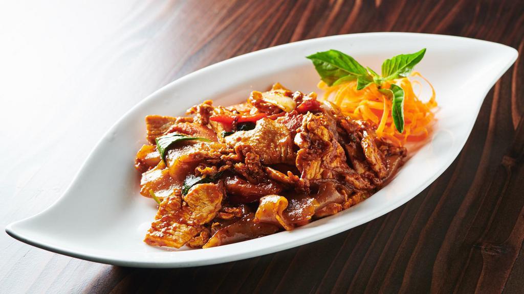 Drunken Noodle · Popular. Spicy stir-fried flat noodles with egg, onion, carrot, bell pepper and basil leaves.