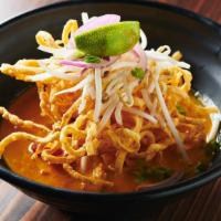 Kao Soi Noodle · Curry noodle. Northern-style noodle in yellow curry broth. Bell pepper, red onion. (Come wit...