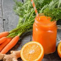 Cholesterol Buster Juice · Fresh juice made with ginger, garlic, spinach and carrots.