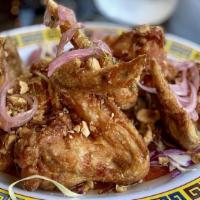 Le Fried Chicken  · our famous twice fried LFC, mint, makrut, peanuts, pickled red onion, money sauce.