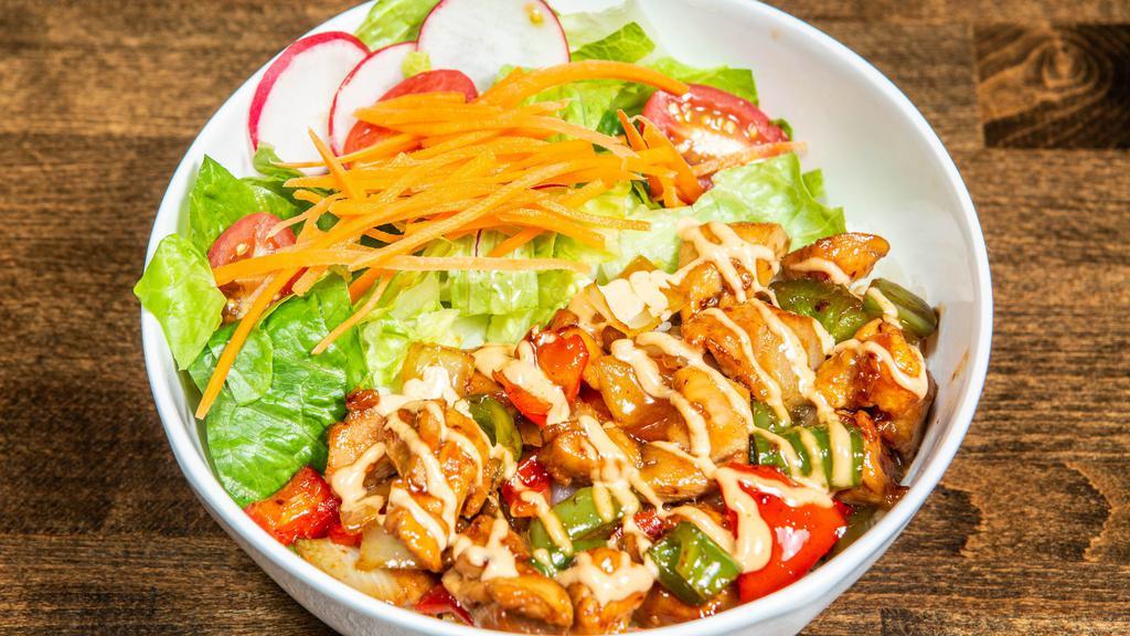 Chicken Teriyaki Rice Bowl · Teriyaki glazed grilled chicken and vegetables (sauteed bell peppers, carrots & onions... then added with cherry tomatoes, romaine and red radish) served over white rice with spicy mayo on top of your selected meat.