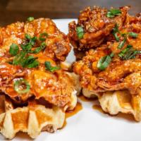 Chicken & Waffles · Korean style fried chicken thighs and waffles served with Mike's hot honey and maple syrup o...