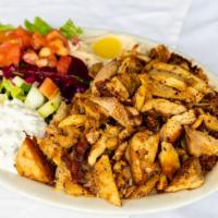 Chicken Shawarma Platter · Sliced boneless chicken breast marinated in vinegar and spices. Served with rice and salad, ...