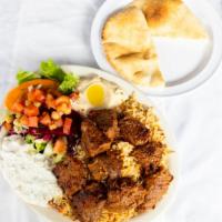 Kafta Kebab Platter · Charcoal grilled ground beef and lamb, parsley, onion, and spices. Served with rice and sala...