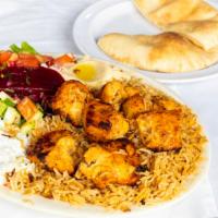 Shish Kebab Platter · Charcoal grilled. Served with rice and salad, your choice of side, and 1 pita.