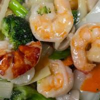  Seafood Delight · Lobster meat scallop jumbo shrimp & crab stick sauteed with mixed vegetables in white sauce.