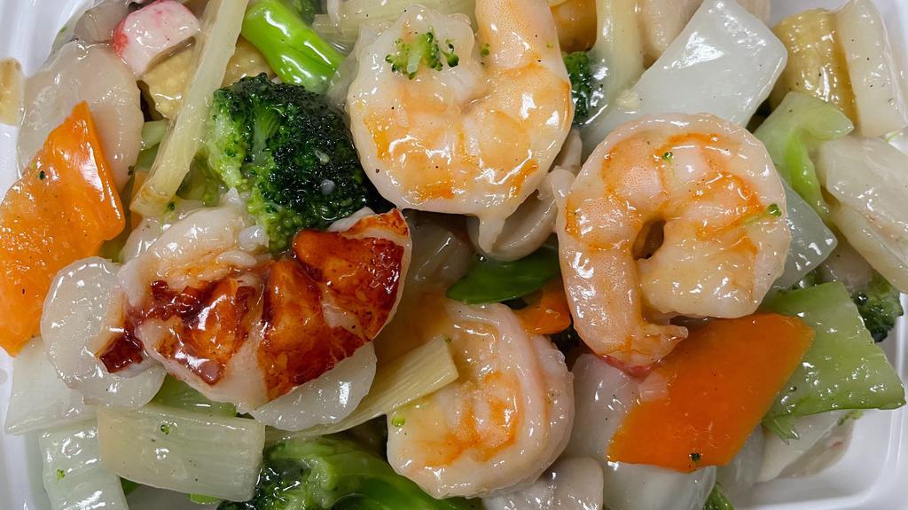  Seafood Delight · Lobster meat scallop jumbo shrimp & crab stick sauteed with mixed vegetables in white sauce.