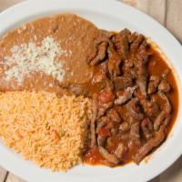 Chilli Colorado · Tender chunks of beef seasoned with red chili sauce, served with rice and beans.